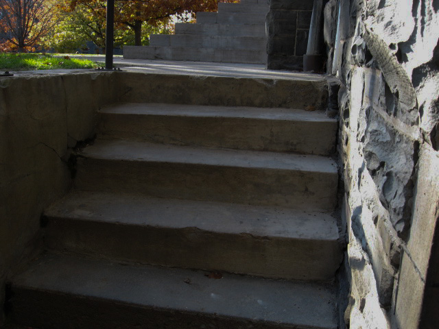 a picture of stairs at a university, going down.